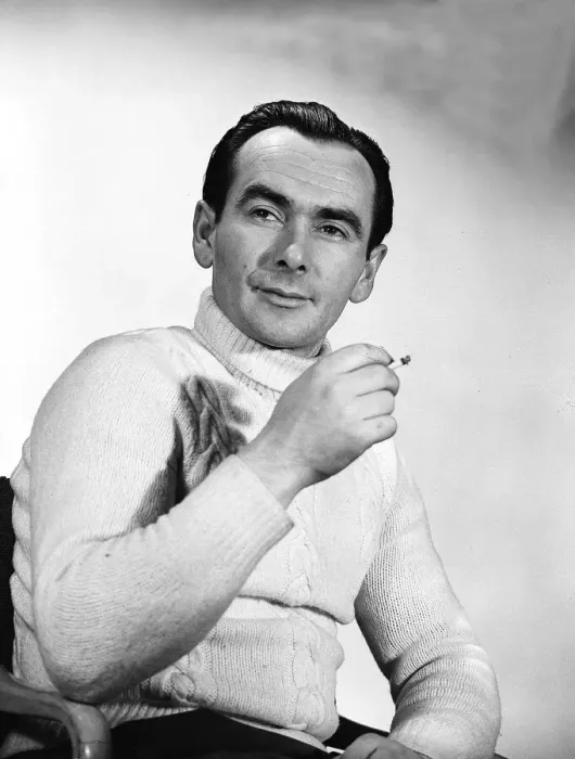 Framed Print : Actor Robert Cousins smoking a cigarette December 1955