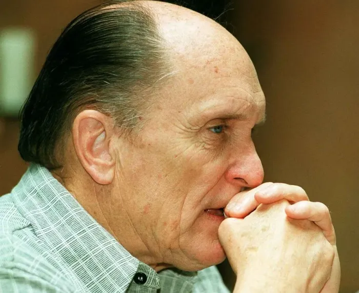 Framed Print : Actor Robert Duvall in Glasgow May 1998 hands clasped at face biting nail Framed Print : Actor Robert Duvall in Glasgow May 1998 hands clasped at face biting nail