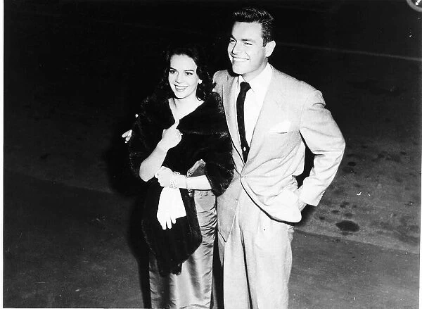 Actor Robert Wagner and actress Natalie Wood on their way to a Tinsel Town Party