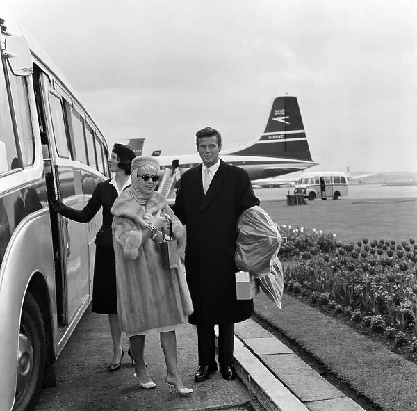 Actor Roger Moore and his wife Dorothy Squires, who flew into LAP today from New York