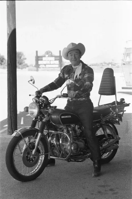 Framed Print : Actor Roy Rogers known as the singing cowboy seen here on a Honda motorbike instead of