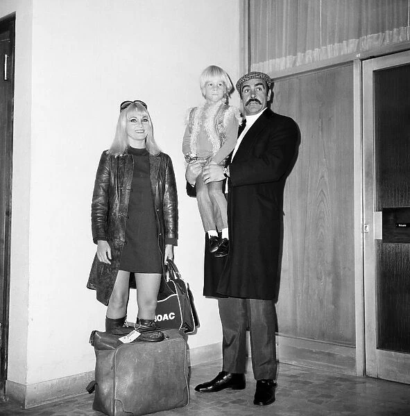 Actor Sean Connery with his wife Diane Cilento and son Jason at Heathrow Airport after
