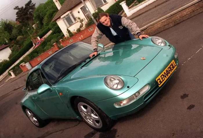 Framed Print : Actor Simon Weir leaning on the bonnet of the Porsche 911 Targa May 1997