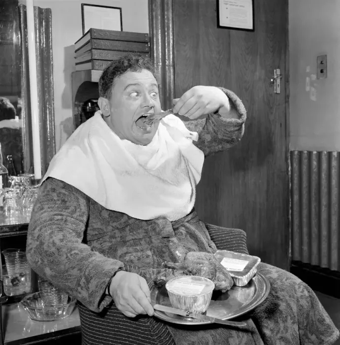 Framed Print : Actor and singer Harry Secombe seen here ordering and then eating a meal order from