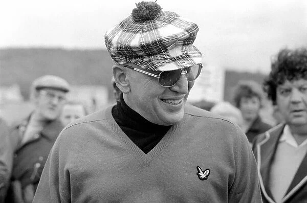 Actor Telly Savalas seen here playing golf. September 1974 S74-5732