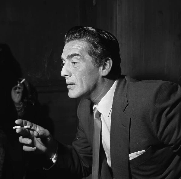 Actor Victor Mature in London to make the film 'Interpol