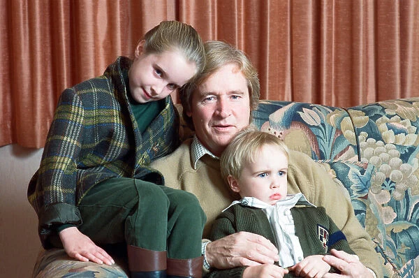 Actor William Roache with two of his children, James and Verity. 1st November 1989