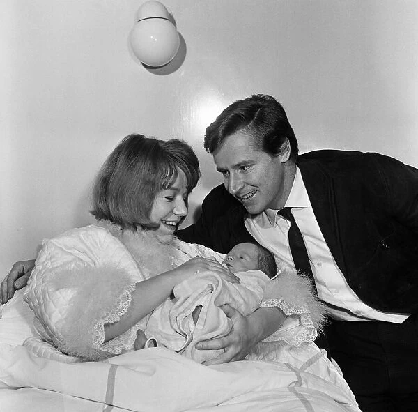 Actor William Roache and his wife Anna with their newborn son Linus. 12th February 1964
