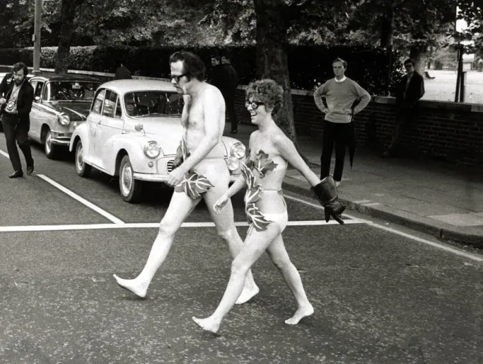 Framed Print : Actors Bill Bailey and Marie Adams crossing Bayswater Road in London naked as they