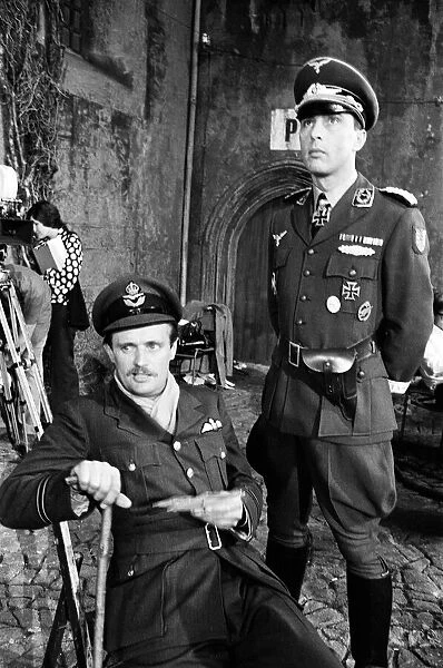 Actors David McCallum (left) and Anthony Valentine on the film set during filming of