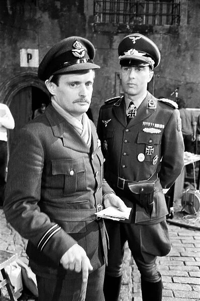 Actors David McCallum (left) and Anthony Valentine on the film set during filming of