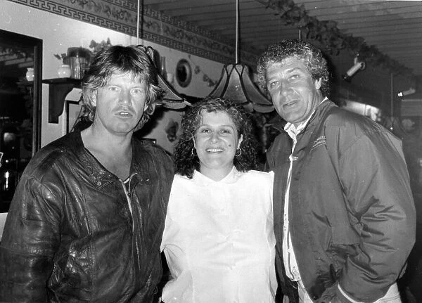 Actors Robin Askwith (left) and Gareth Hunt pictured with Francessca James at Giovannis