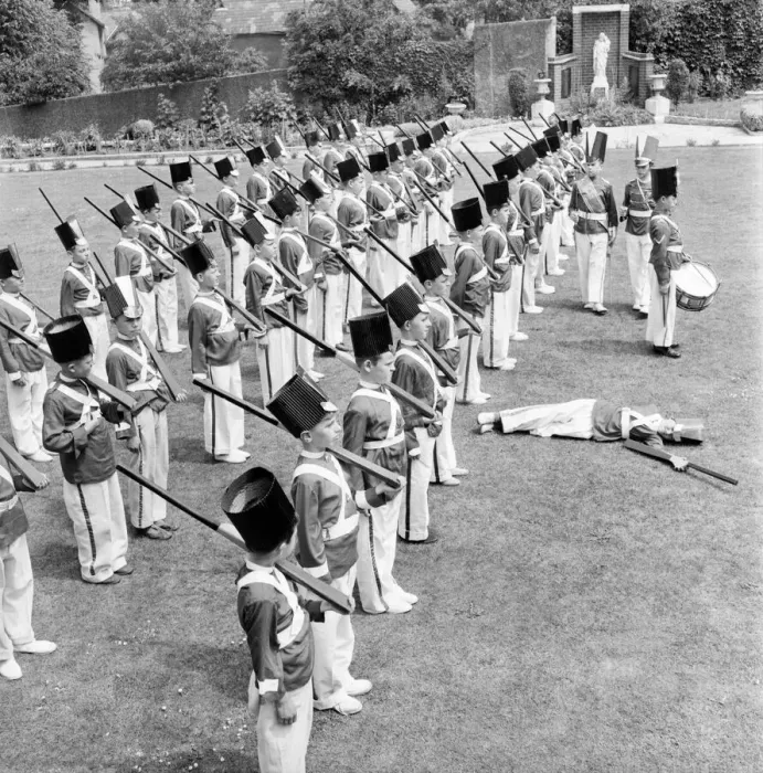 Framed Print : Actors, toy soldiers on parade: Toy soldiers fainting whilst rehearsing at St Josephs