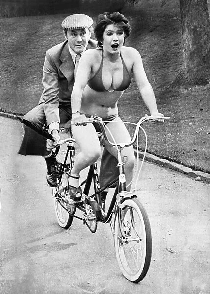 Actress (and former Doctor Who companion) Deborah Watling on a bike in Aberdeen with co