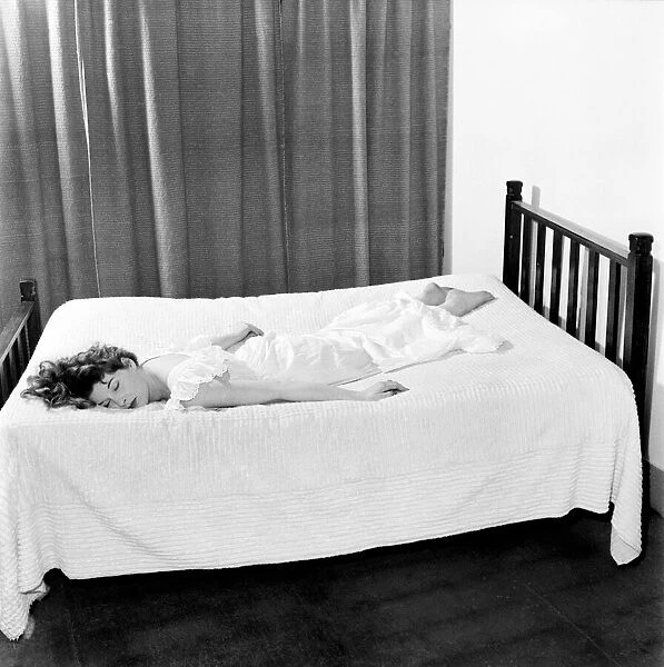 Actress Andre Corri sleeping. December 1953 D7607