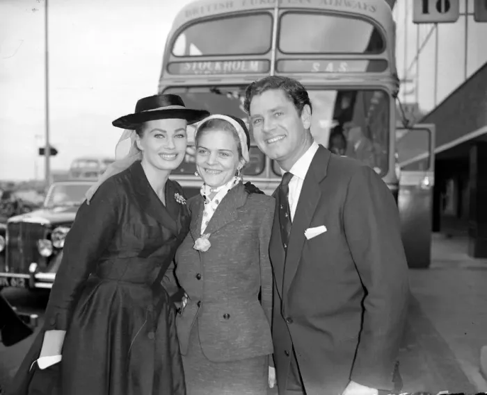 Framed Print : Actress Anita Ekberg left seen here with her husband Anthony Steel greeting her sister