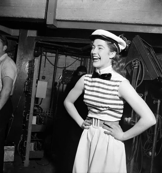 Actress Audrey Freeman wearing striped top, bow tie and sailors hat