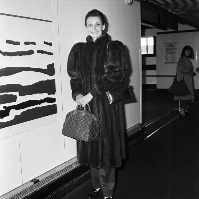 Framed Print : Actress Audrey Hepburn at an airport. April 1984