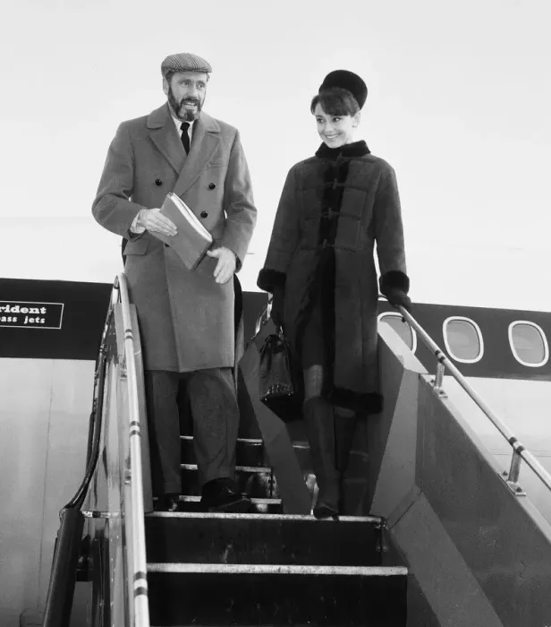 Framed Print : Actress Audrey Hepburn pictured with her husband Mel ferrer arriving in London Framed Print : Actress Audrey Hepburn pictured with her husband Mel ferrer arriving in London