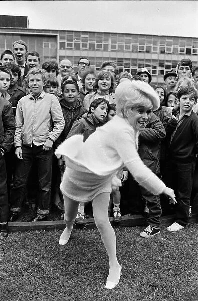 Actress Barbara Windsor was lucky on the coconut shy at The William Ellis School summer