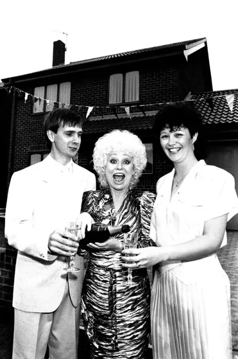Framed Print : Actress Barbara Windsor proposes a house-warming toast to DIY builders Allan Framed Print : Actress Barbara Windsor proposes a house-warming toast to DIY builders Allan