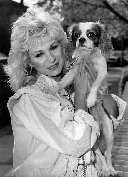 Actress: Debbie Arnold with dog. November 1984 P000683