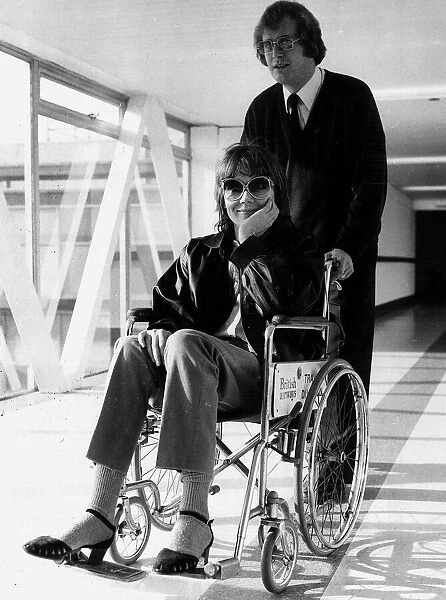 Actress Diana Rigg who is in a wheelchair due to a problem with her spine 1979