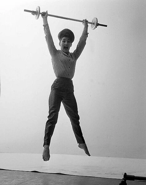 Actress Elizabeth Kent January 1963 Lifting weights