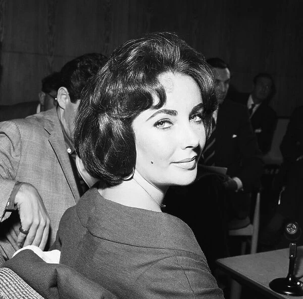 Actress Elizabeth Taylor seen here during a press conference with husband Eddie Fisher