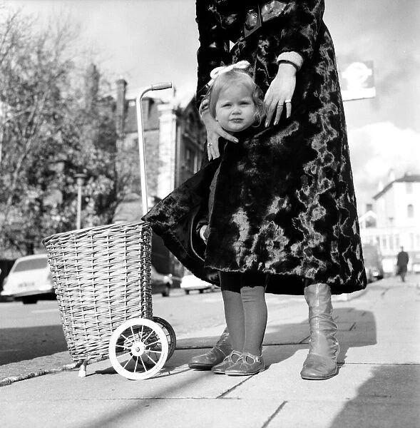actress Francis Dean who lives in Fairfax Road, N. W. 6. wears a maxi-coat