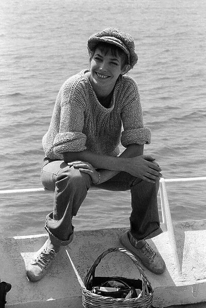 Actress Jane Birkin wearing a wooly jumper and cap at the Cannes Film Festival