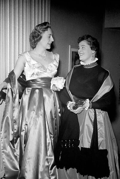 Actress Jane Hylton in an open necked evening dress, designed by Sheila Graham