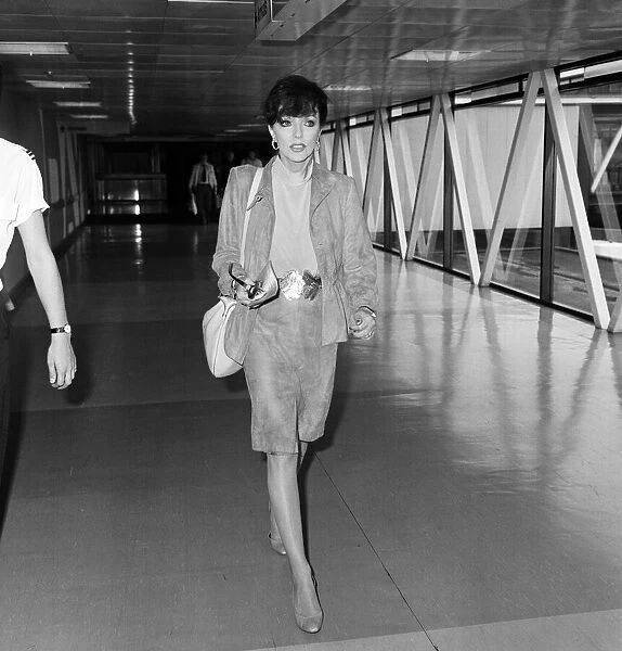 Actress Joan Collins at an airport. May 1982