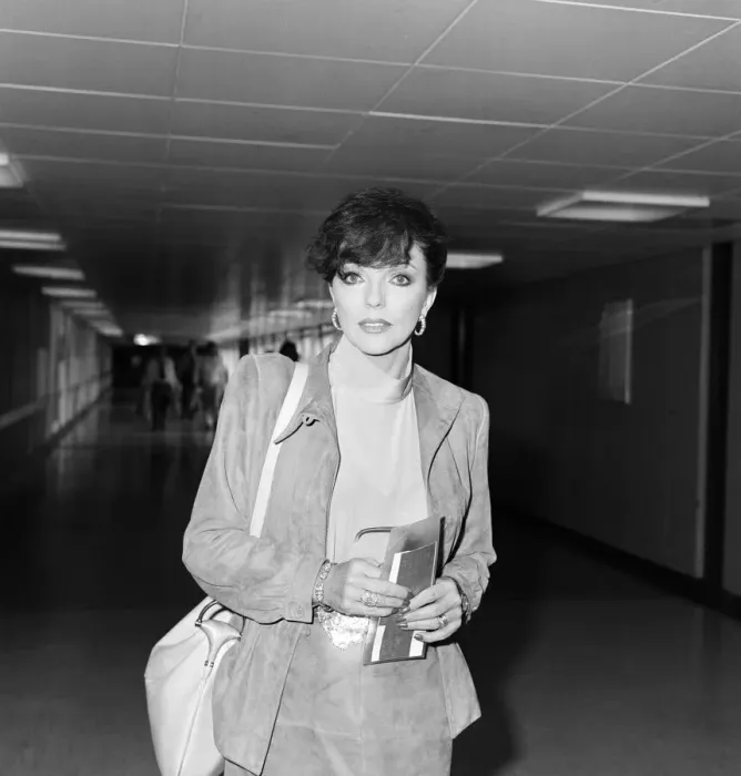 Framed Print : Actress Joan Collins at an airport. May 1982 Framed Print : Actress Joan Collins at an airport. May 1982