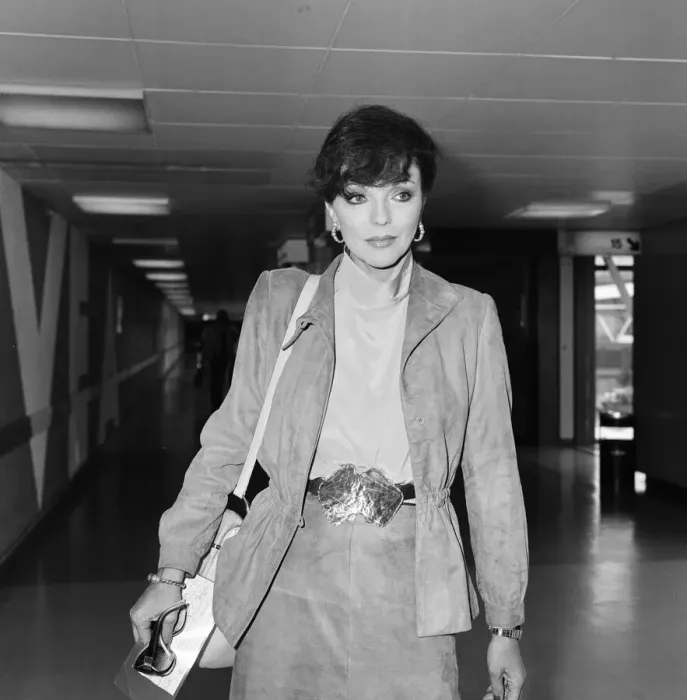 Framed Print : Actress Joan Collins at an airport. May 1982 Framed Print : Actress Joan Collins at an airport. May 1982