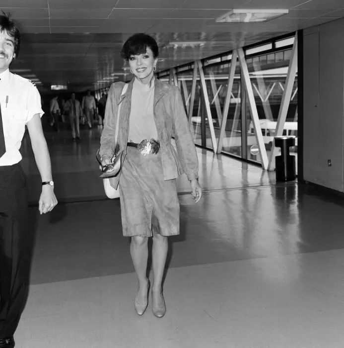 Framed Print : Actress Joan Collins at an airport. May 1982 Framed Print : Actress Joan Collins at an airport. May 1982