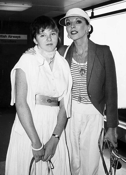 Actress Joan Collins with her daughter at Heathrow airport. August 1980