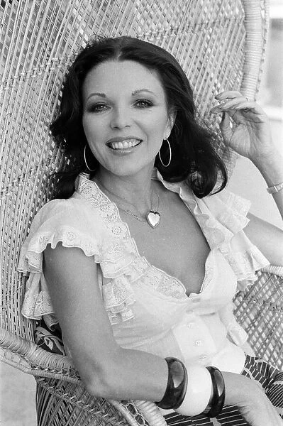 Actress Joan Collins has moved back to Hollywood. She has bought a luxurious home in