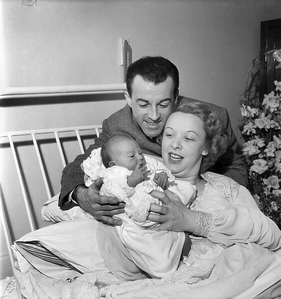 Actress Joy Nichols with husband and baby. March 1952 C1251-001