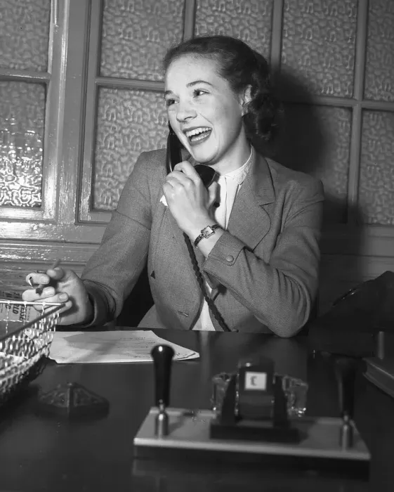 Framed Print : Actress Julie Andrews talking on the phone behind her desk January 1954 Framed Print : Actress Julie Andrews talking on the phone behind her desk January 1954