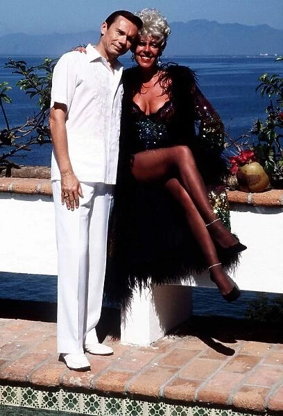 Actress Julie Goodyear with her husband Richard Skrob enjoying an exotic first
