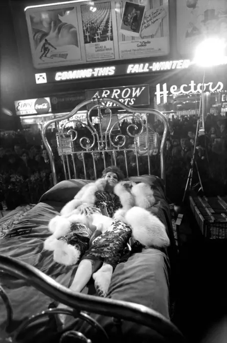 Framed Print : Actress Julie Newmar lying on a brass bed in New York Framed Print : Actress Julie Newmar lying on a brass bed in New York