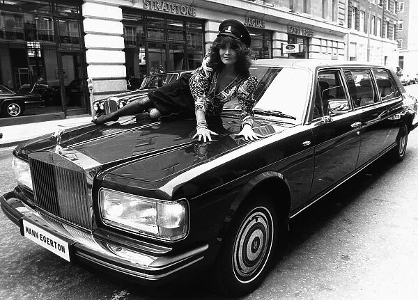 Actress Kate O Mara on the bonnet of a Rolls Royce October 1987 Of Dynasty