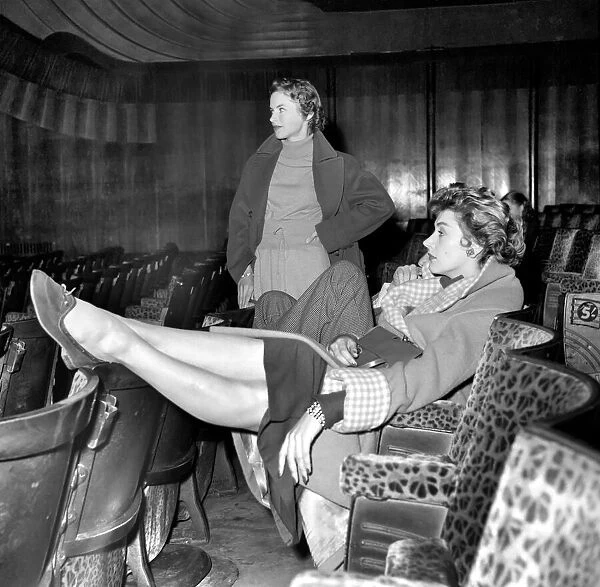 Actress Kay Kendall (seated) at the Odeon Cinema for rehearsals before the Royal film