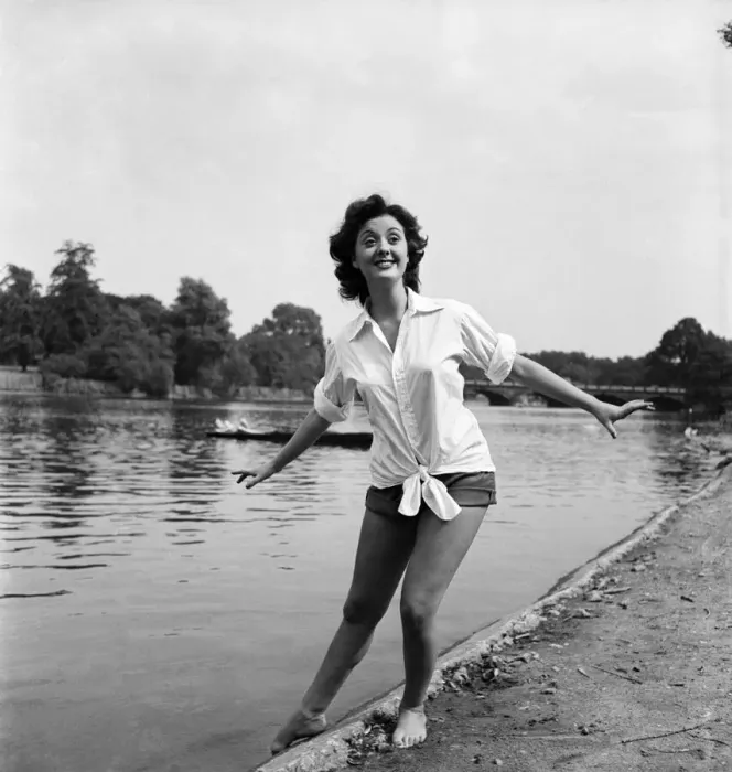 Framed Print : Actress Lana Morris wears a shirt over her shorts. August 1949 O20168-002 Framed Print : Actress Lana Morris wears a shirt over her shorts. August 1949 O20168-002