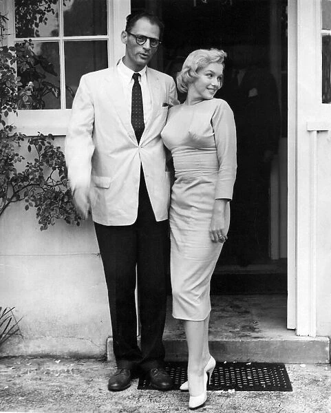 Actress Marilyn Monroe pictured with her playwright husband Arthur Miller at Parkside