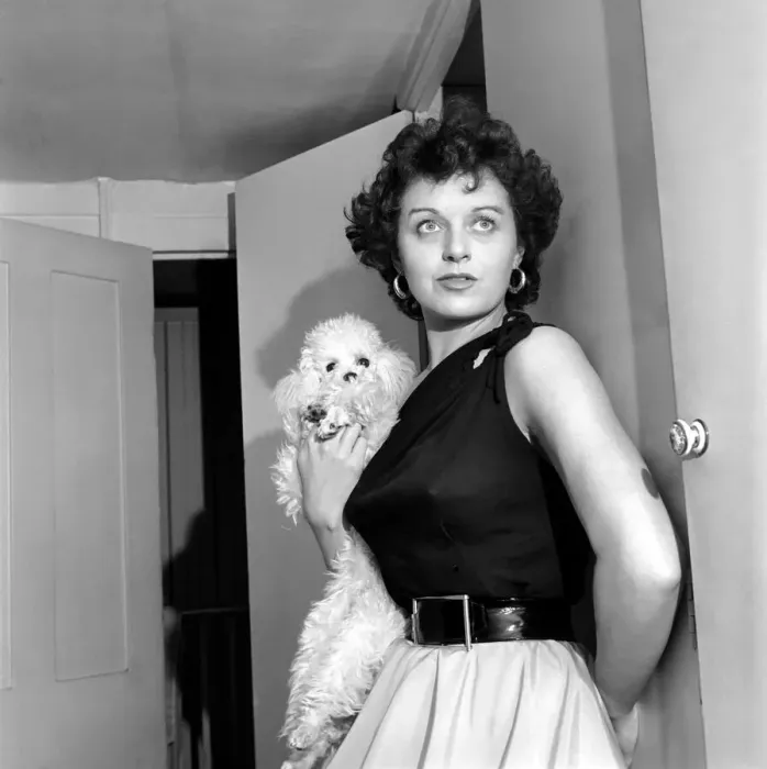 Framed Print : Actress Miss Elizabeth Webb with her poodle whose name is Skoshi. October 1953 D6060