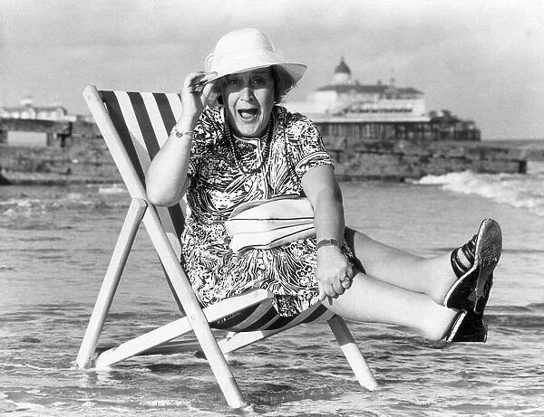 Actress Molly Sugden seen here all awash on Eastbourne beach