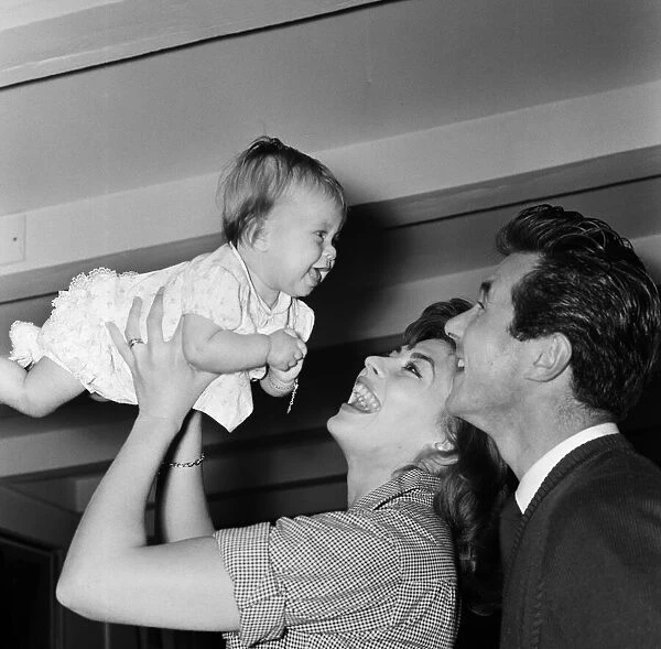 Actress Nanette Newman and her husband Bryan Forbes, with their baby daughter Sarah Kate