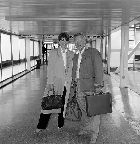 Actress Nanette Newman and her husband Bryan Forbes at Heathrow Airport. 3rd May 1987